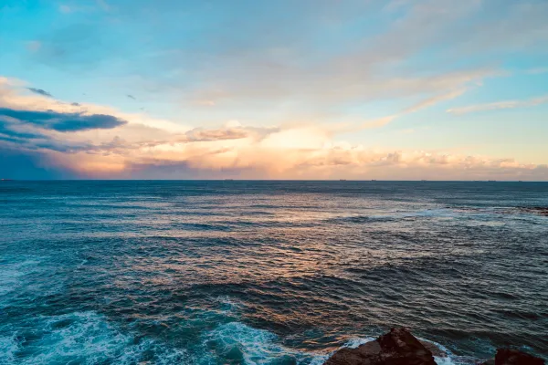 Blue ocean at sunset
