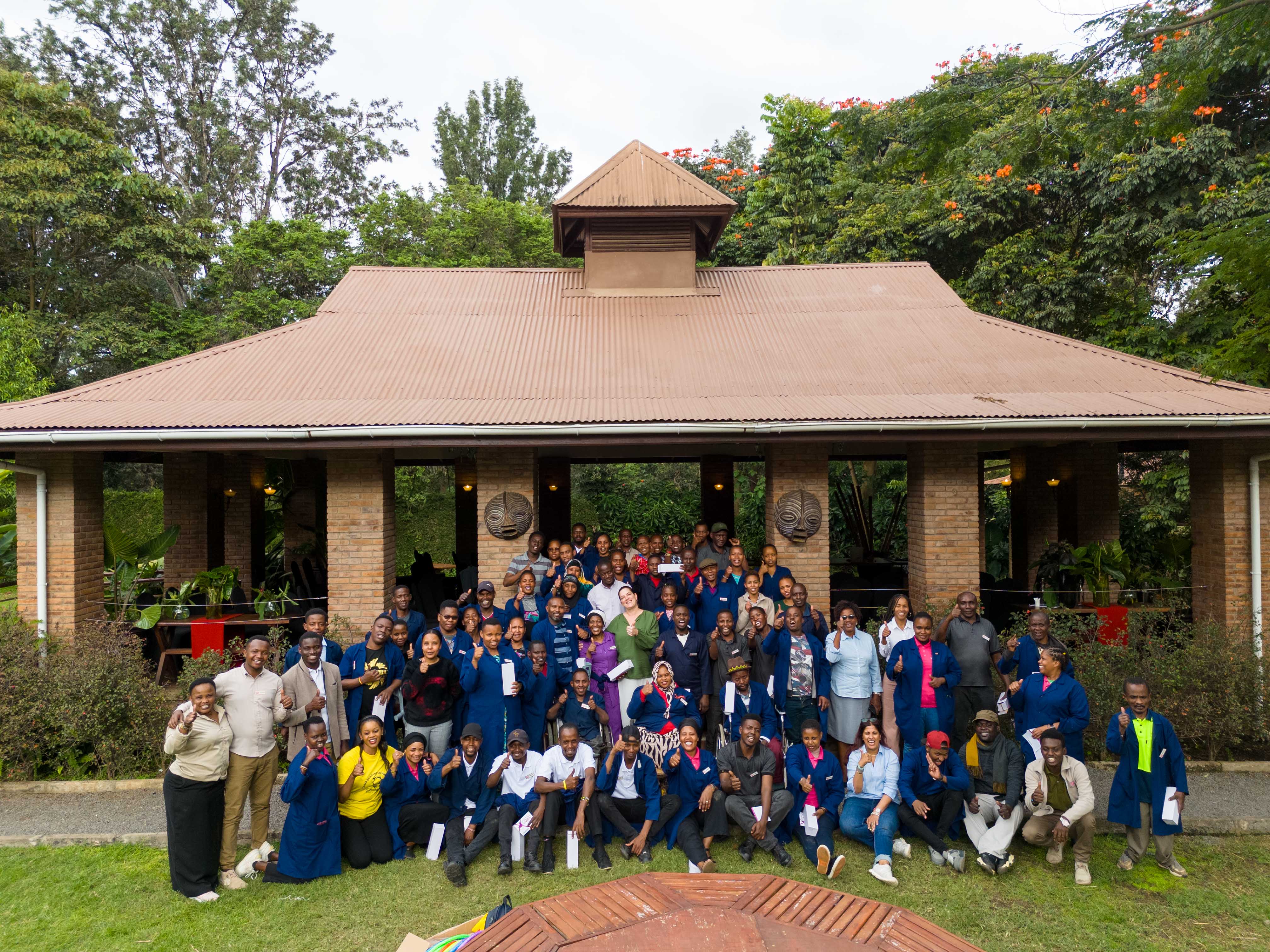 Group photo outside the main building