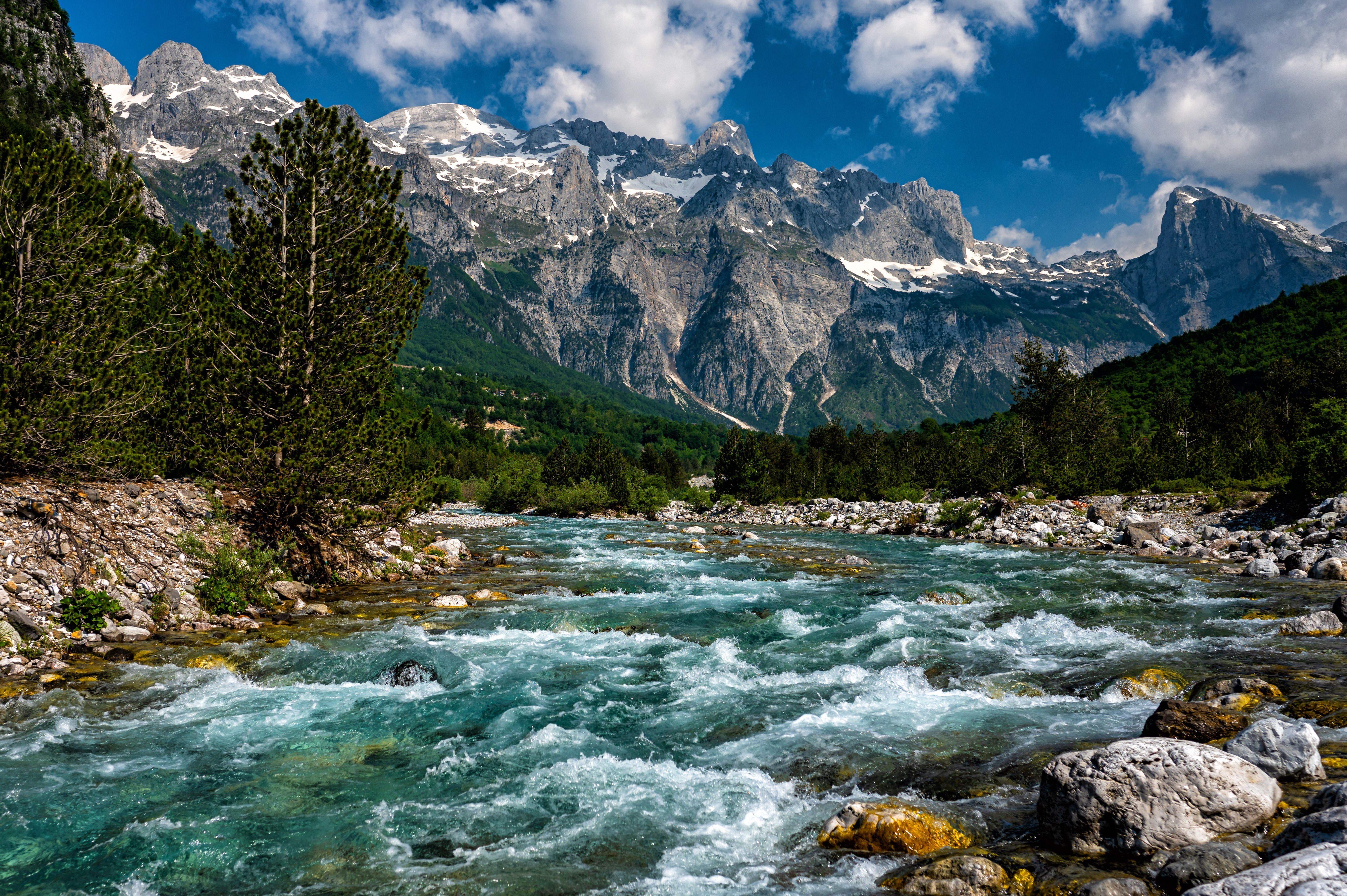 River in front of mountains