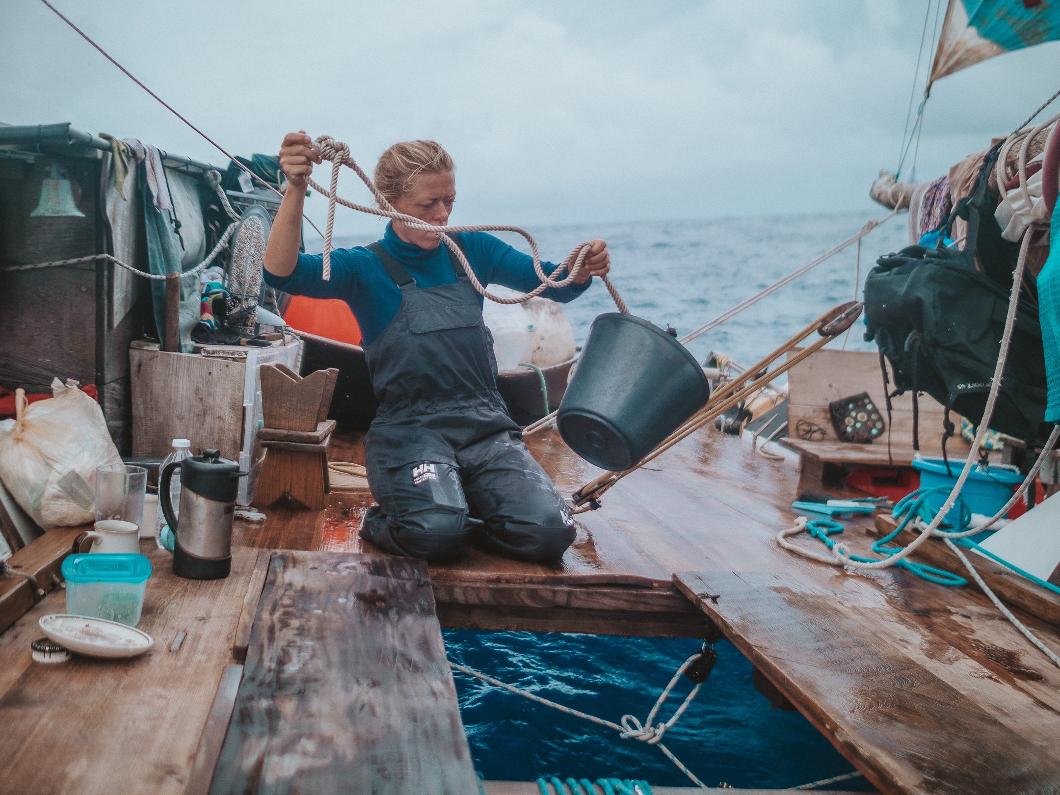 Gathering ocean water via a bucket