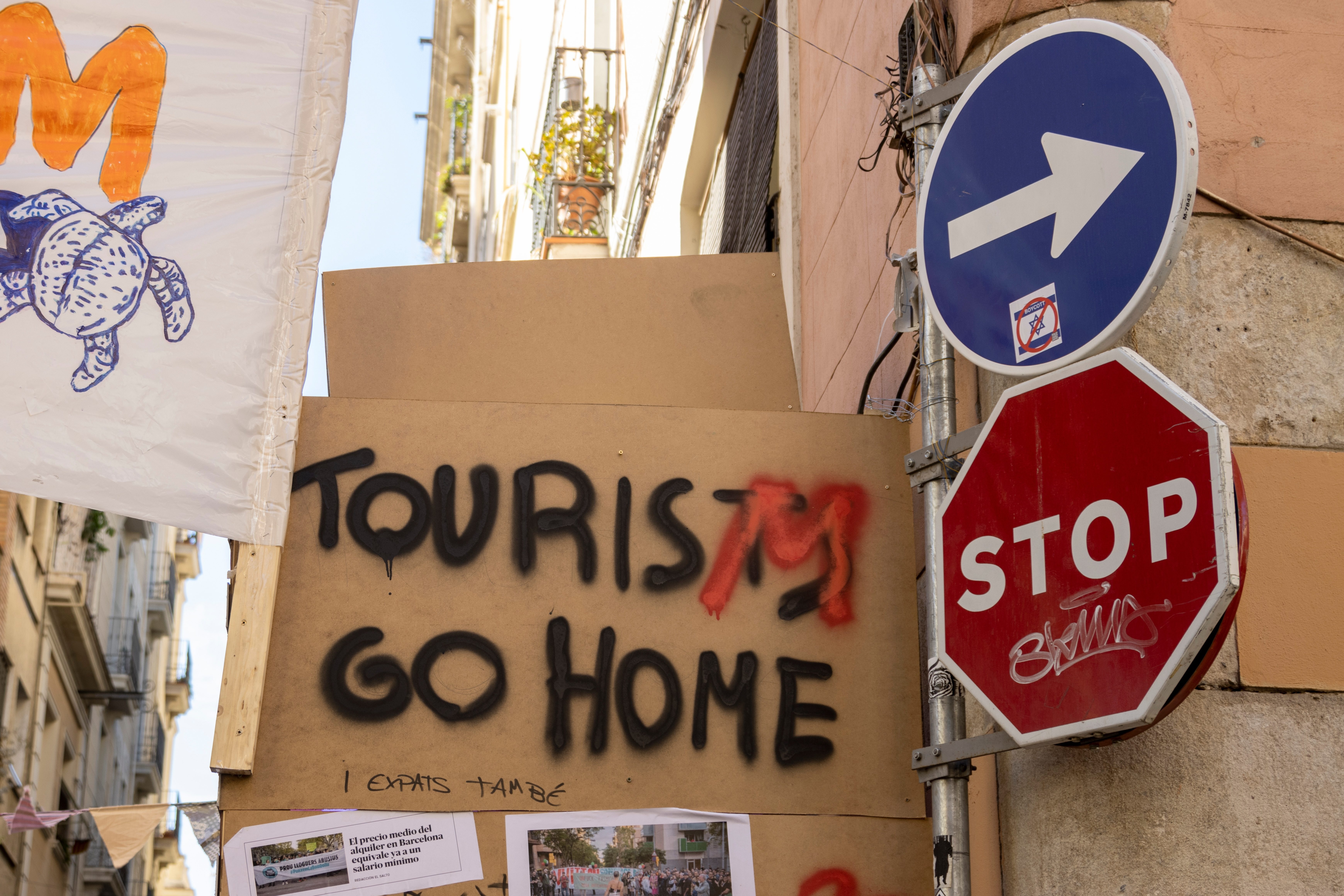 tourism protest sign