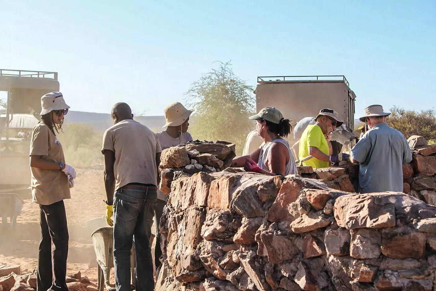 Volunteers building well