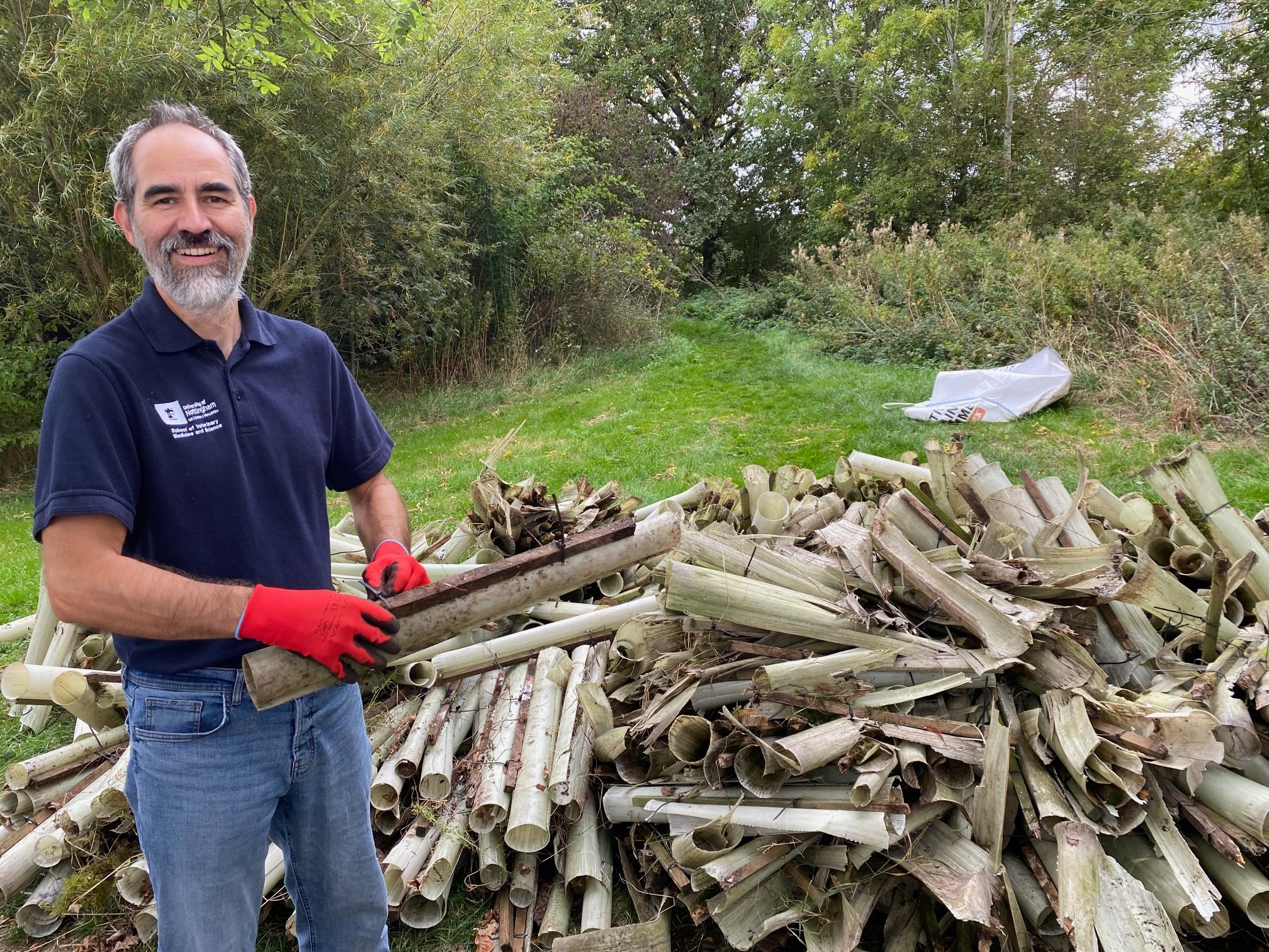Wilder International member infront of shavings