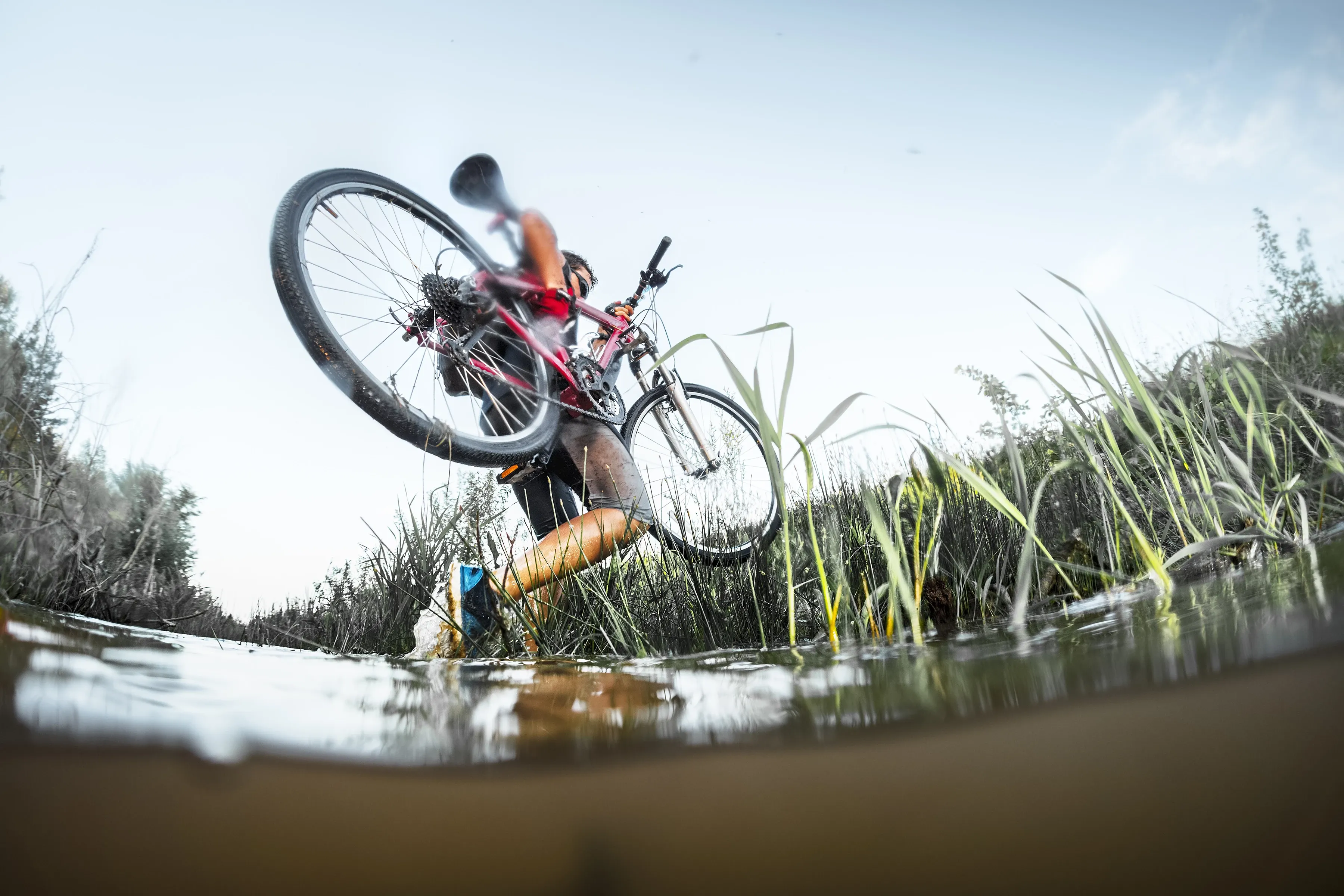 someone carrying bicycle