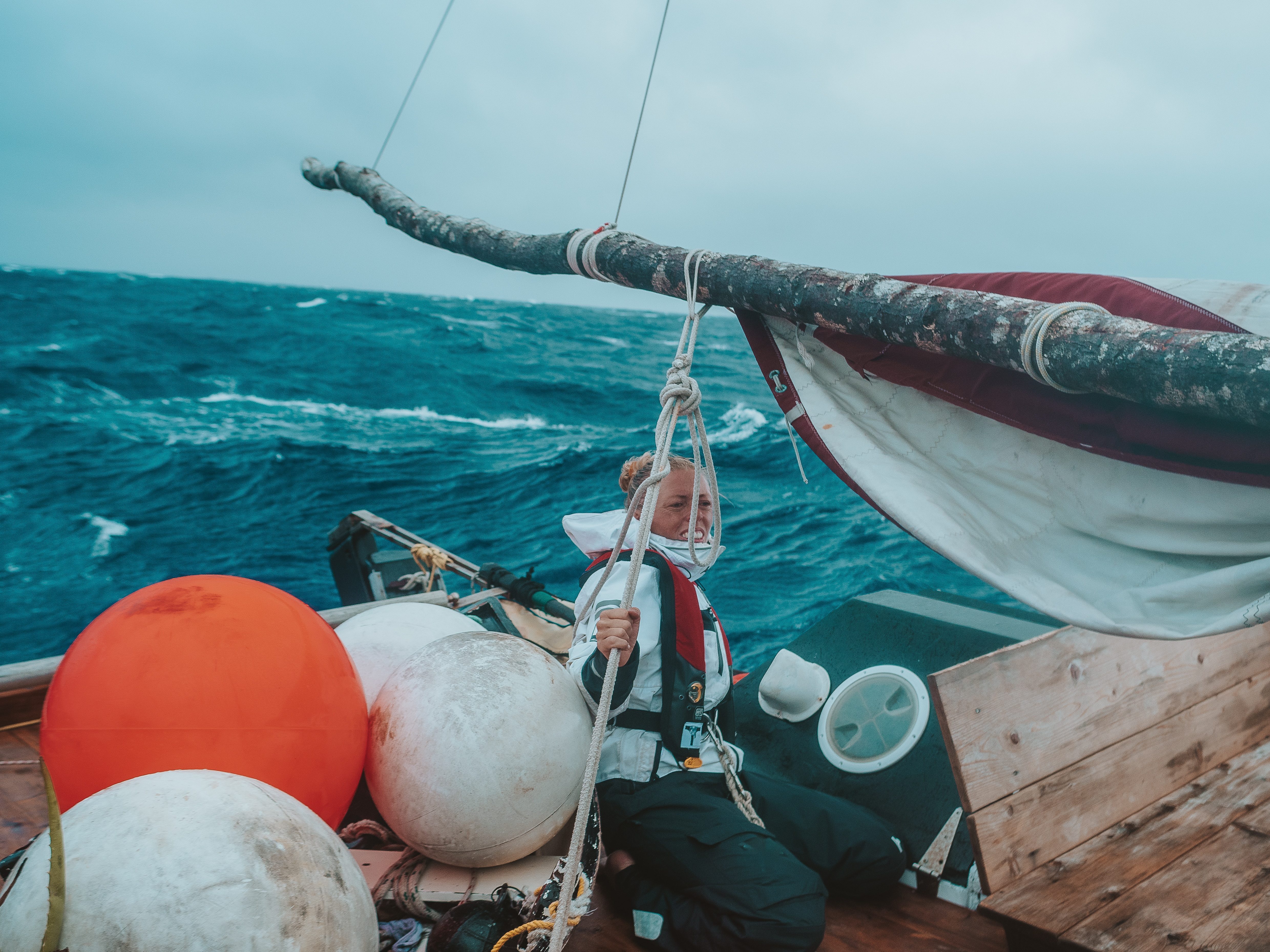 Team holding strong during bad weather on sea