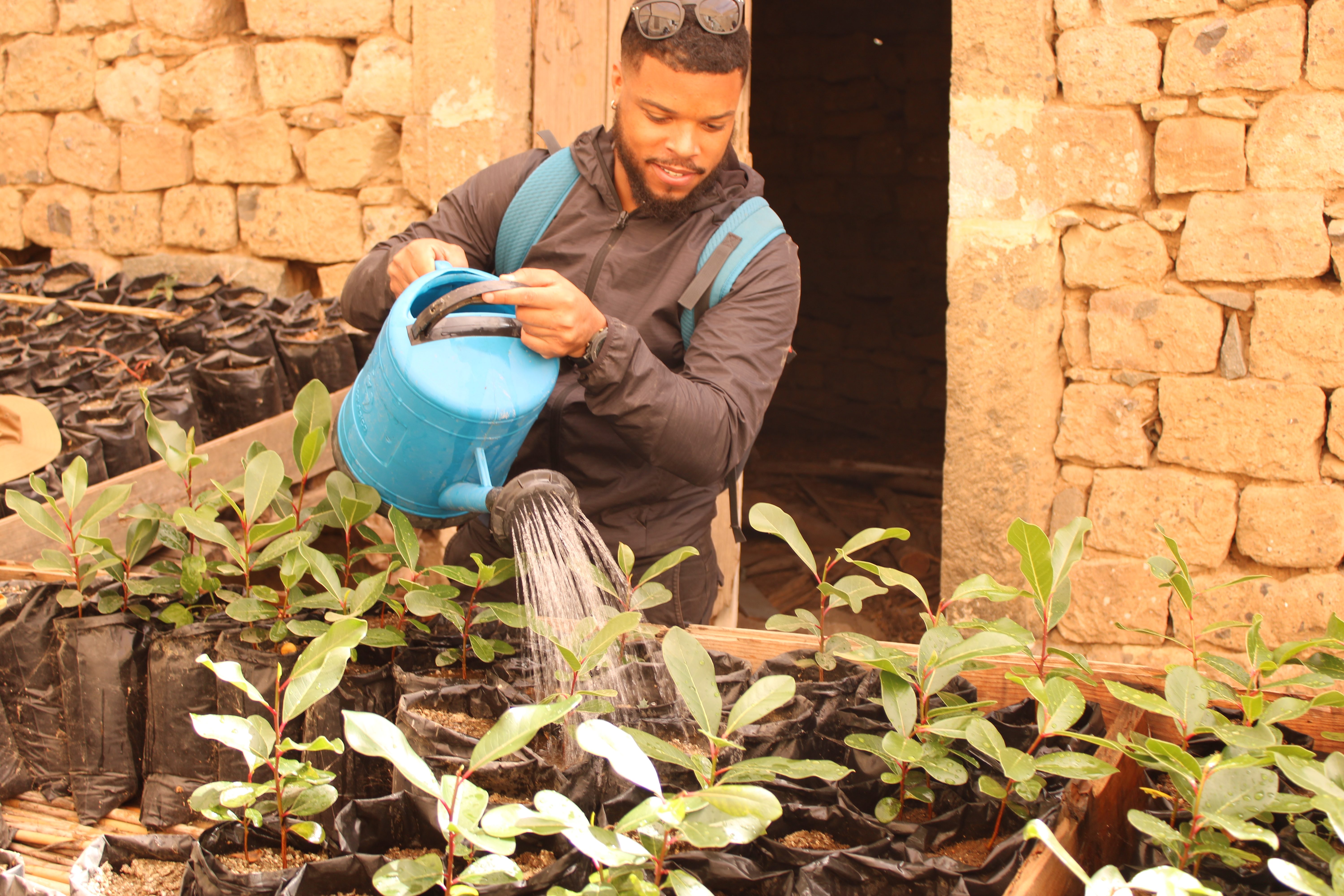 volunteer watering plants