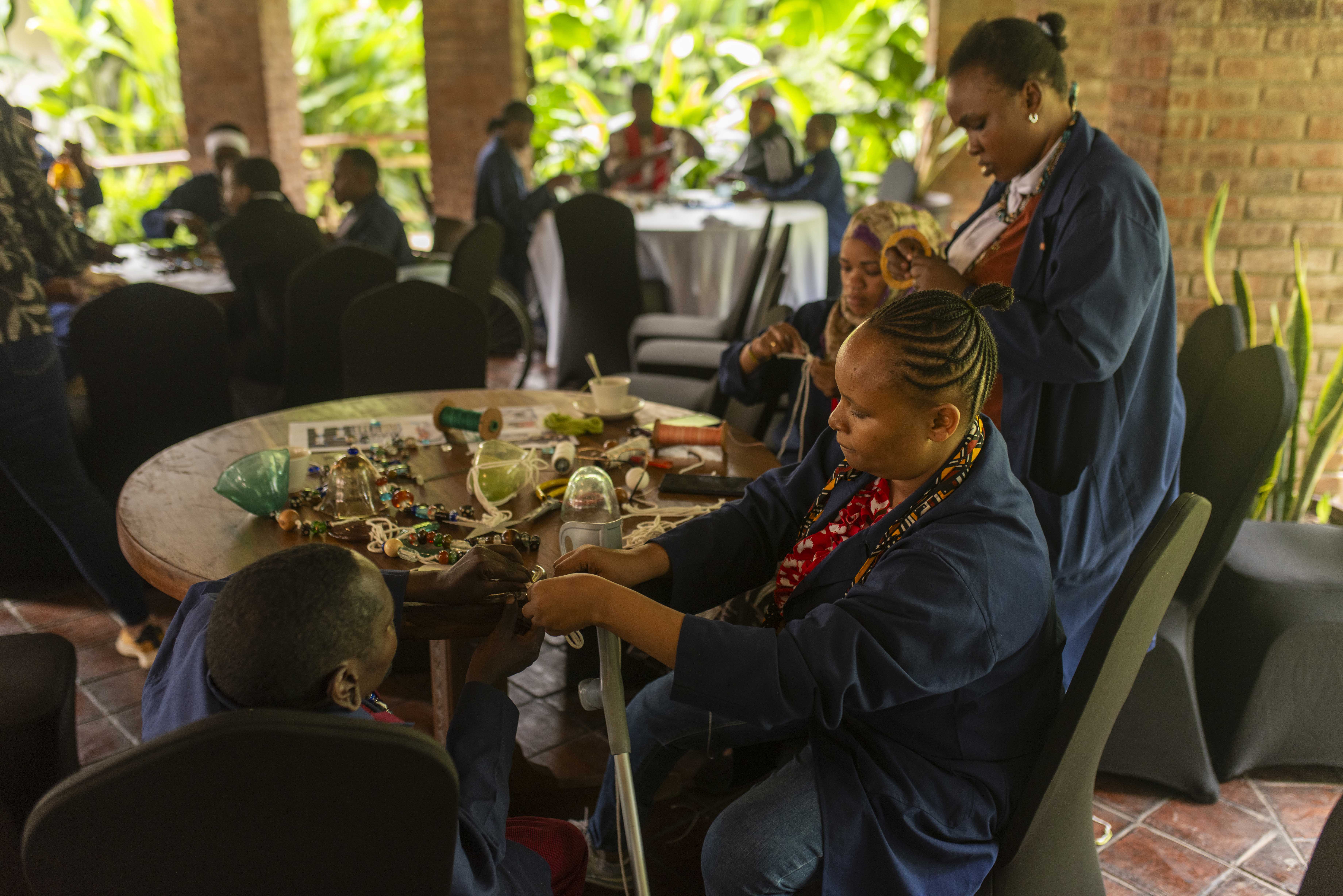 Group busy making jewelry
