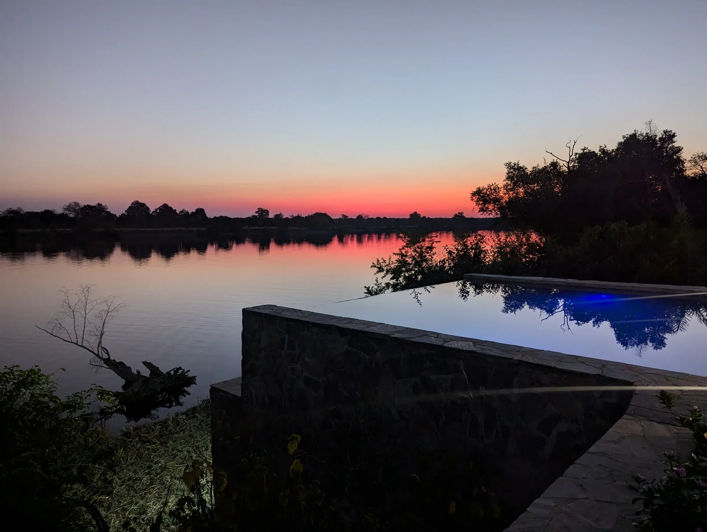 Infinity pool against river