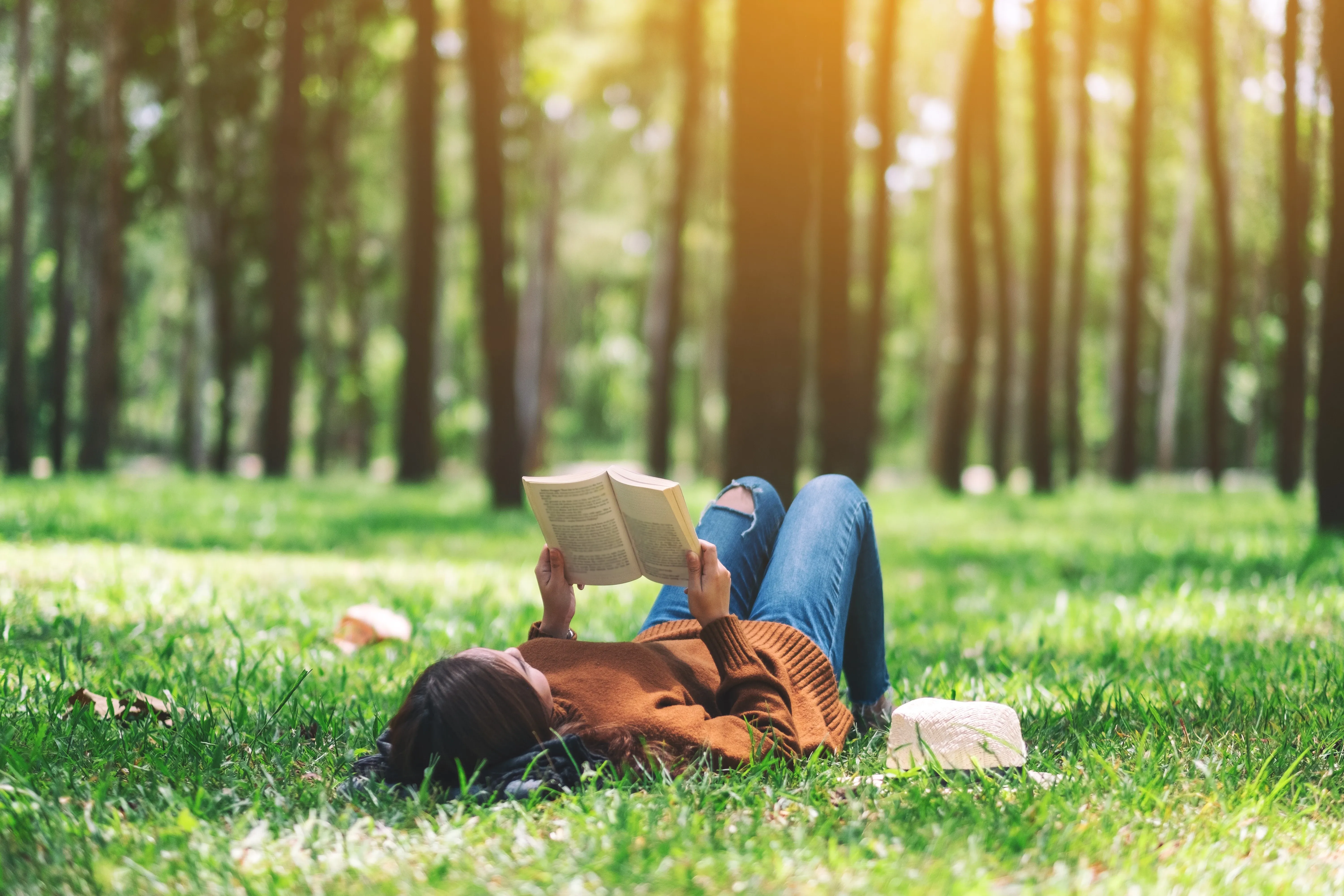 woman reading in nature