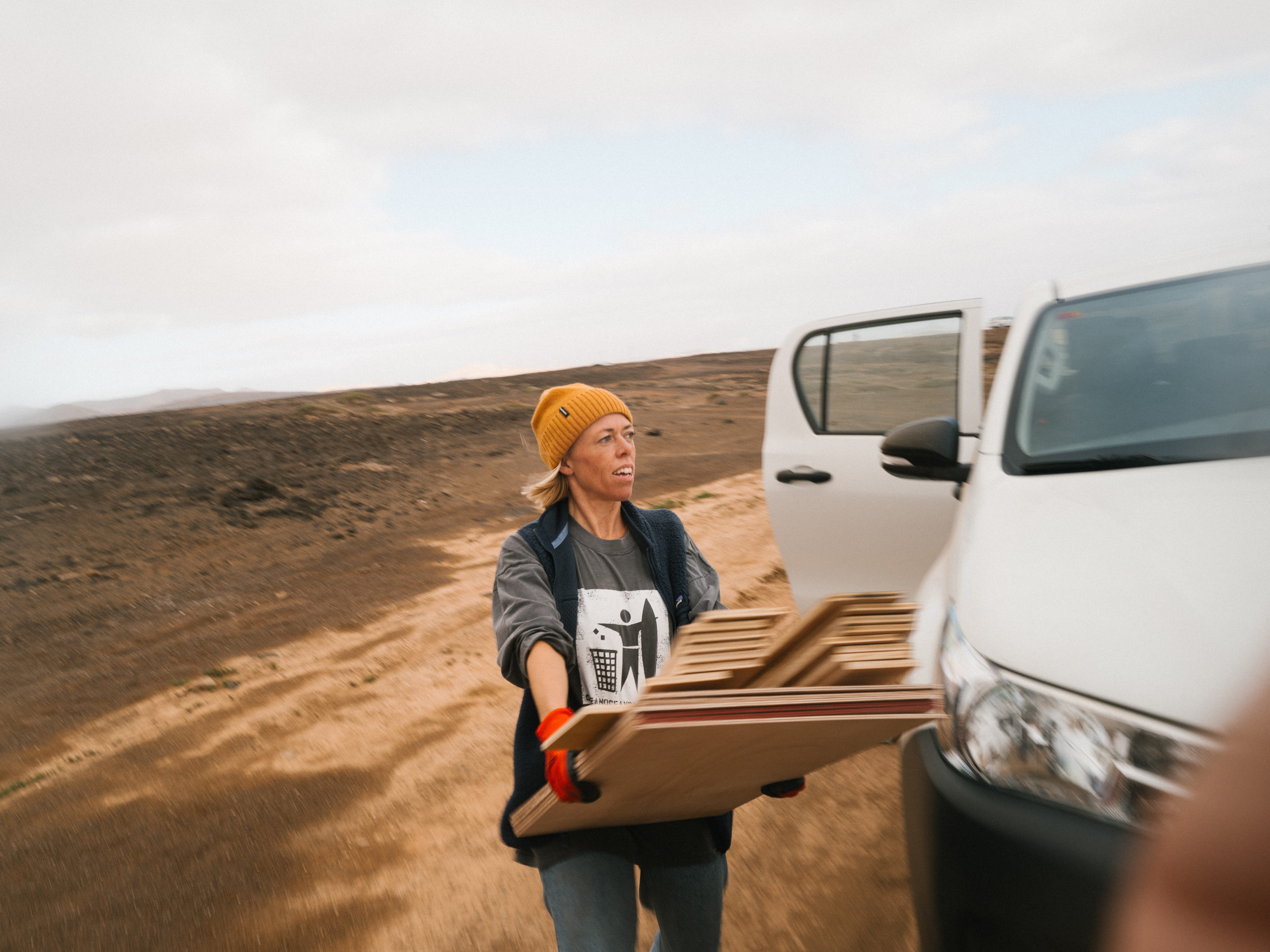Moving construction material from vehicle