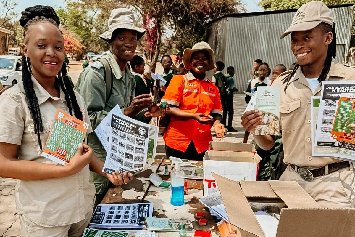 kwalata community development initiative handing out flyers