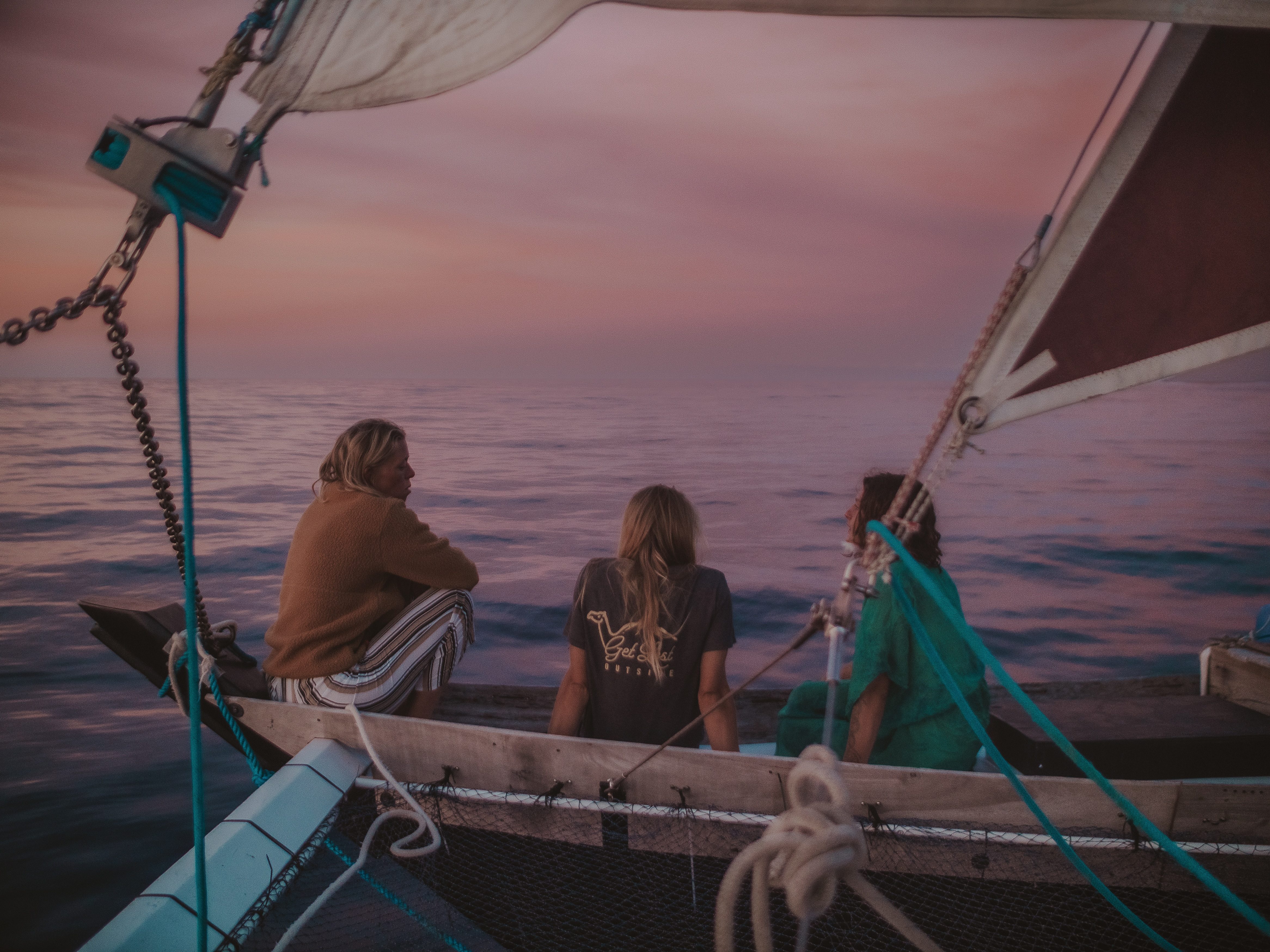Team contemplating the journey underneath the sunset