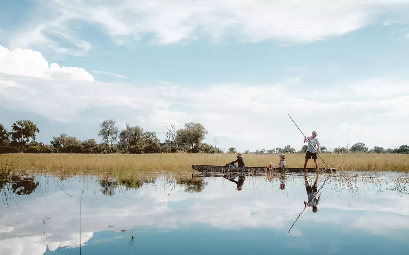 Mokoro with people on the water