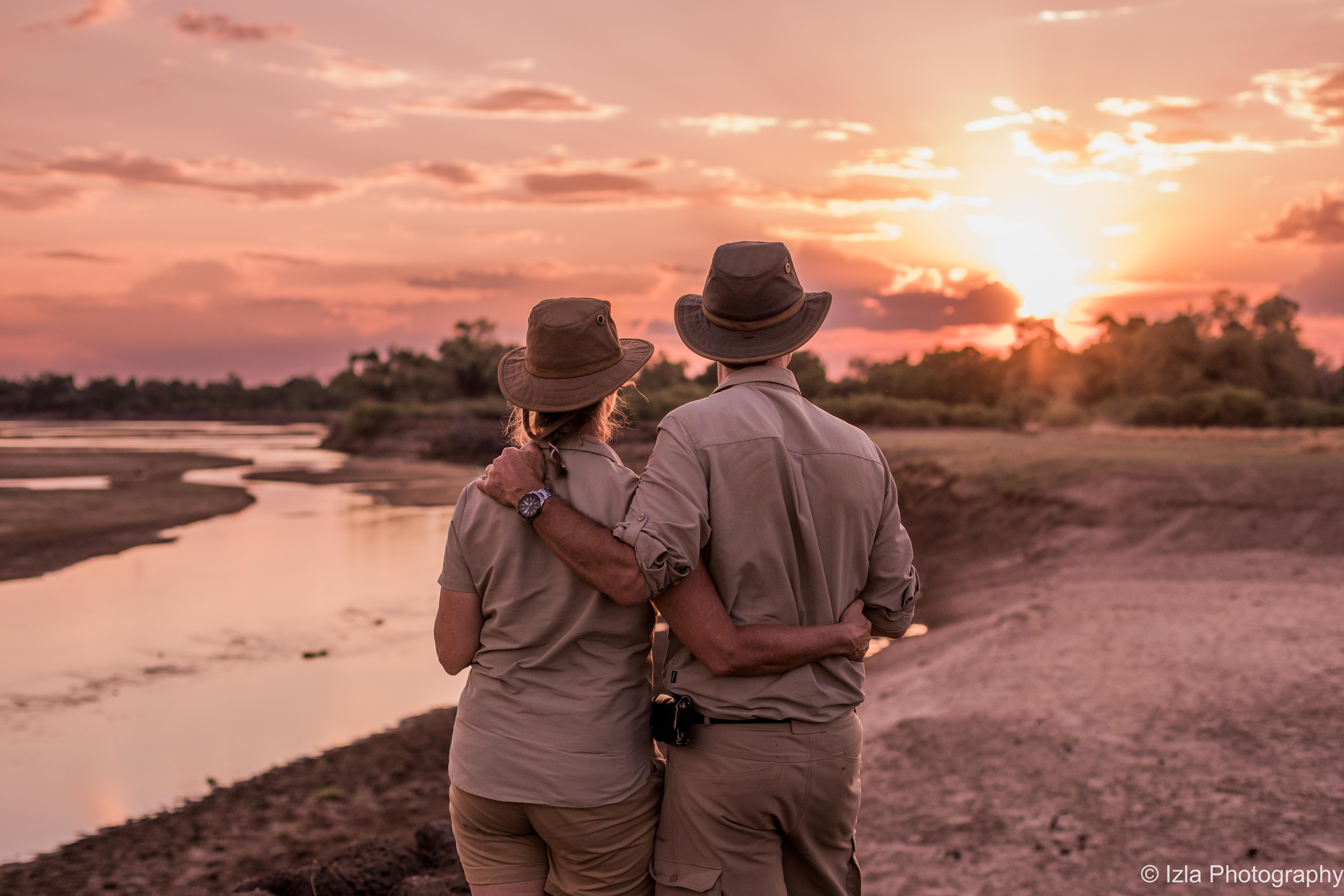 Guests appreciating sundowner